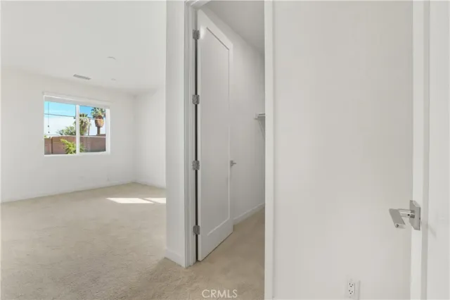 a view of an empty walk in closet