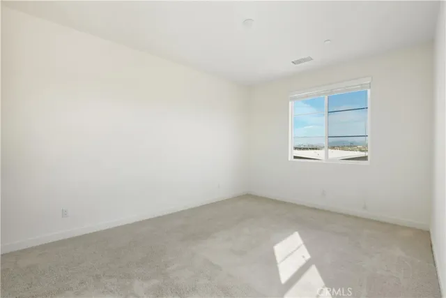 a bathroom with a granite countertop sink double and mirror