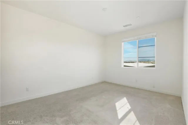 a bathroom with a granite countertop sink double and mirror