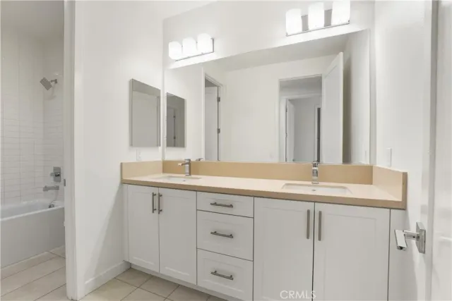 a bathroom with a bathtub and a toilet