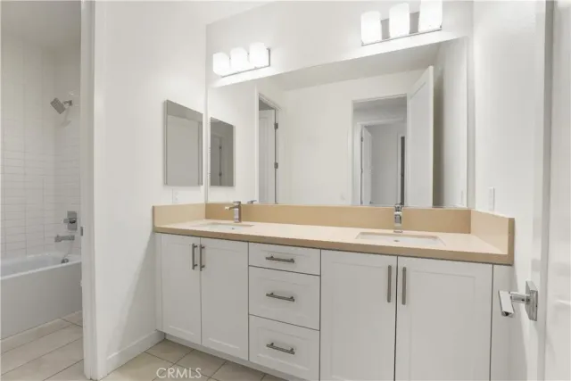 a bathroom with a bathtub and a toilet