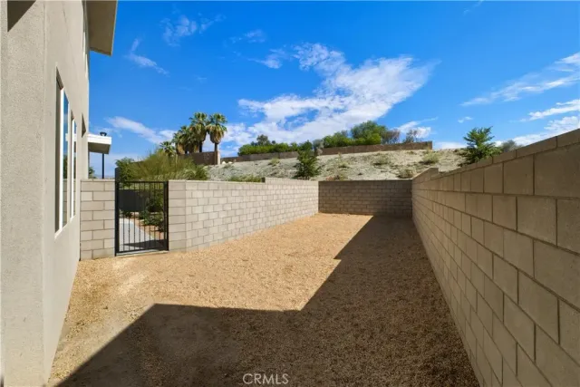 a view of a patio with swimming pool