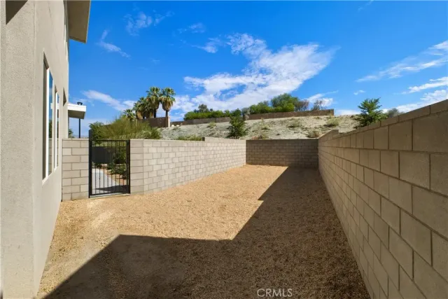 a view of a patio with swimming pool