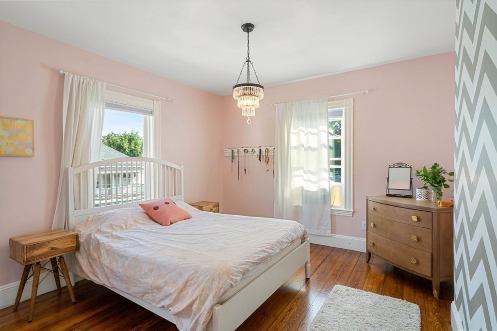 11 Hadwin Way Boston, MA 02131 - Photo 15 of 22 a bedroom with a bed and a window