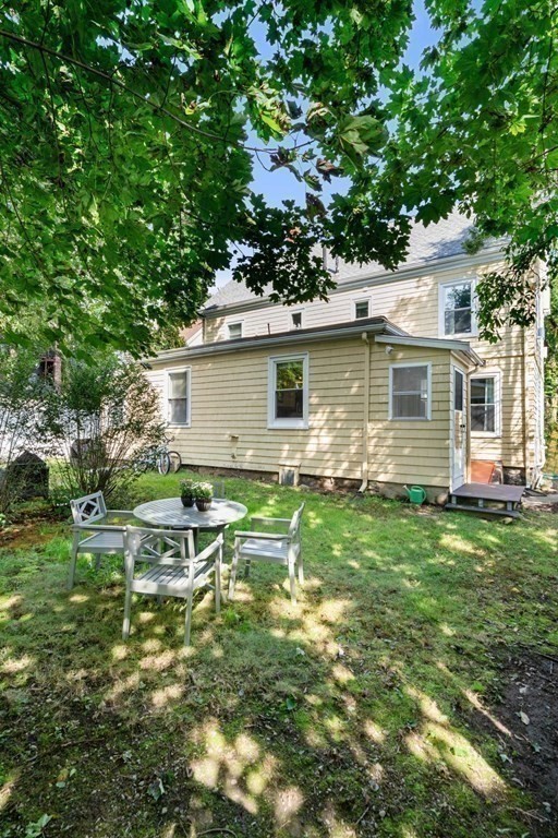 11 Hadwin Way Boston, MA 02131 - Photo 21 of 22 a backyard of a house with seating space