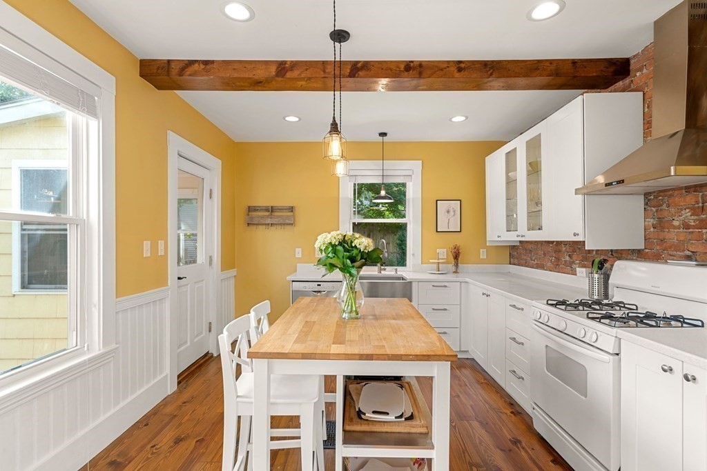 11 Hadwin Way Boston, MA 02131 - Photo 5 of 22 a kitchen with granite countertop a sink and cabinets