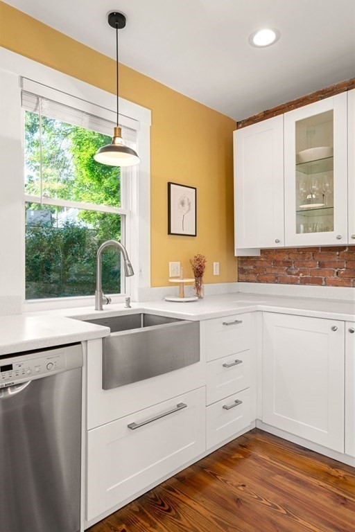 11 Hadwin Way Boston, MA 02131 - Photo 6 of 22 a kitchen with stainless steel appliances granite countertop a stove a sink and a wooden floor