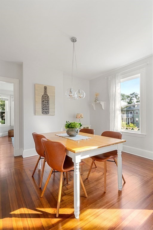 11 Hadwin Way Boston, MA 02131 - Photo 7 of 22 a view of a dining room with furniture window and wooden floor