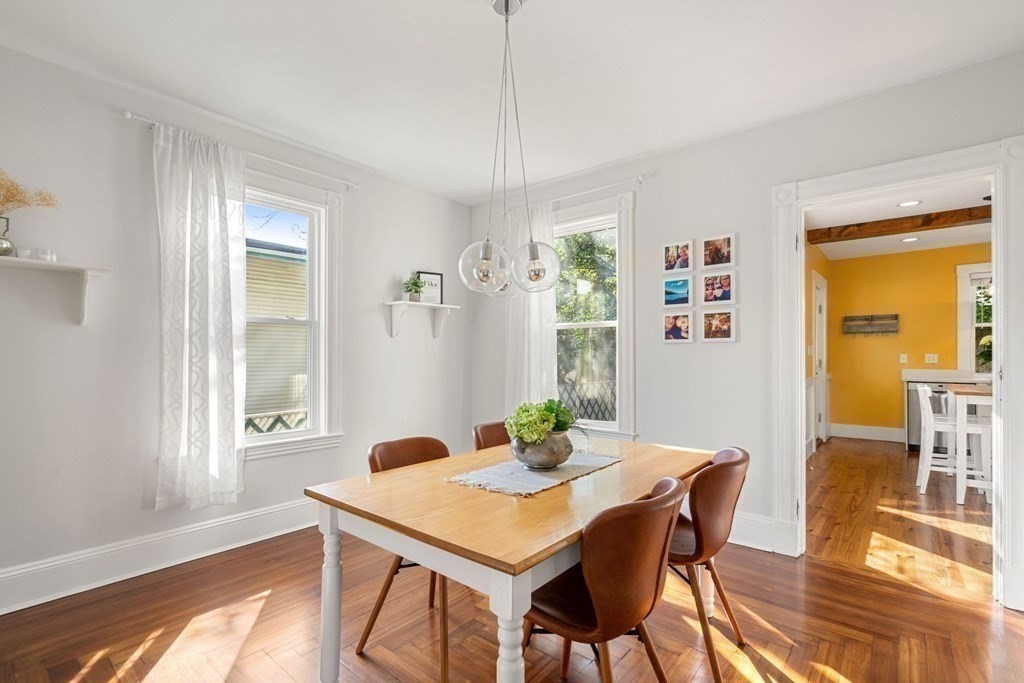 11 Hadwin Way Boston, MA 02131 - Photo 8 of 22 a view of a dining room with furniture window and wooden floor