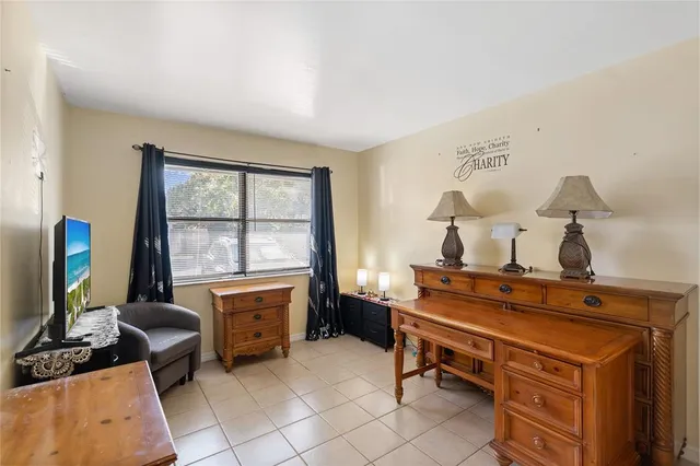 a room with furniture and a flat screen tv