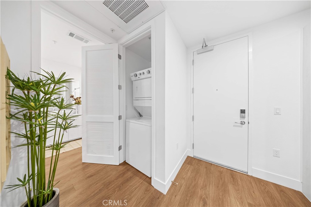 709 East Walnut Street, Unit 222 Pasadena, CA 91101 - Photo 14 of 46 a view of entryway with wooden floor