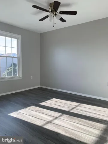 a bathroom with a toilet and a sink