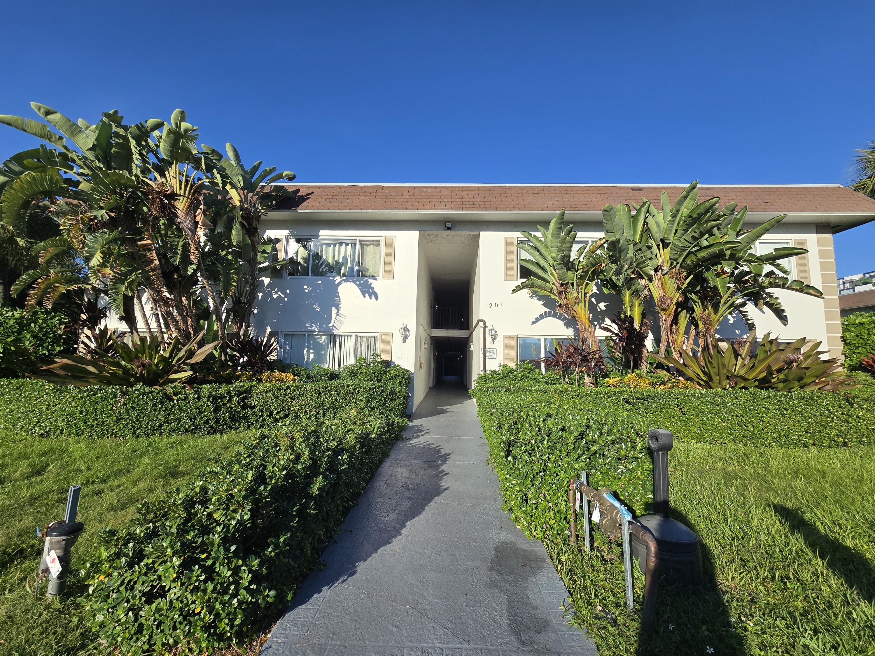 a view of house with garden