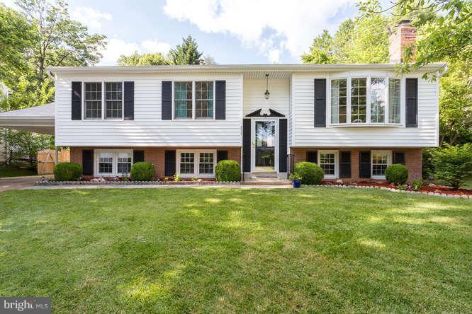 9522 Kirkfield Road Burke, VA 22015 - Photo 2 of 23 a front view of a house with a yard