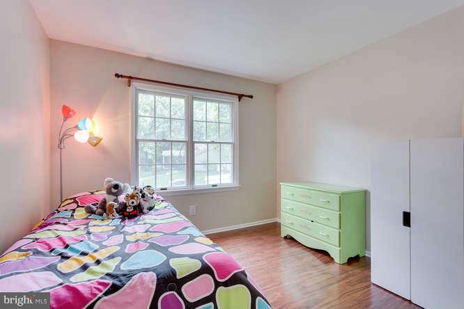 9522 Kirkfield Road Burke, VA 22015 - Photo 11 of 23 a bedroom with a bed and a window