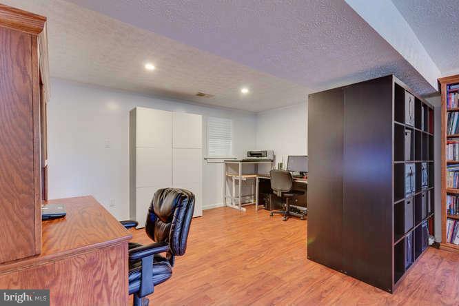 9522 Kirkfield Road Burke, VA 22015 - Photo 15 of 23 a workspace with furniture hardwood and a window