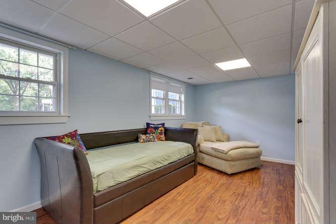 9522 Kirkfield Road Burke, VA 22015 - Photo 19 of 23 a bedroom with bed and window