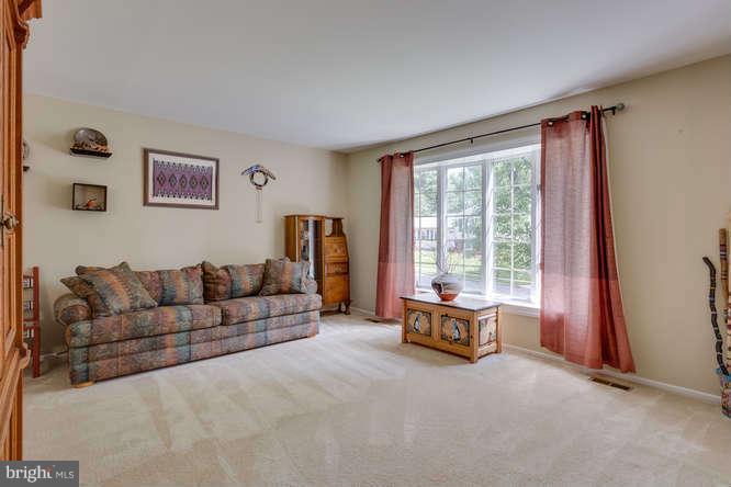 9522 Kirkfield Road Burke, VA 22015 - Photo 4 of 23 a living room with furniture and a large window