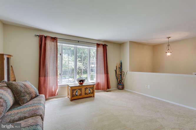 9522 Kirkfield Road Burke, VA 22015 - Photo 5 of 23 a living room with furniture and a large window