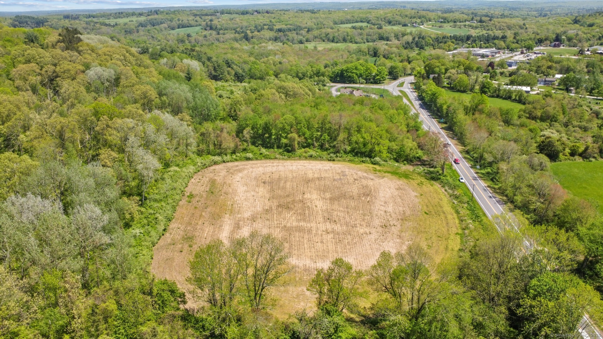 0 Mashamoquet Road Pomfret Center, CT 06259 - Photo 2 of 5 a view of a yard with an outdoor space