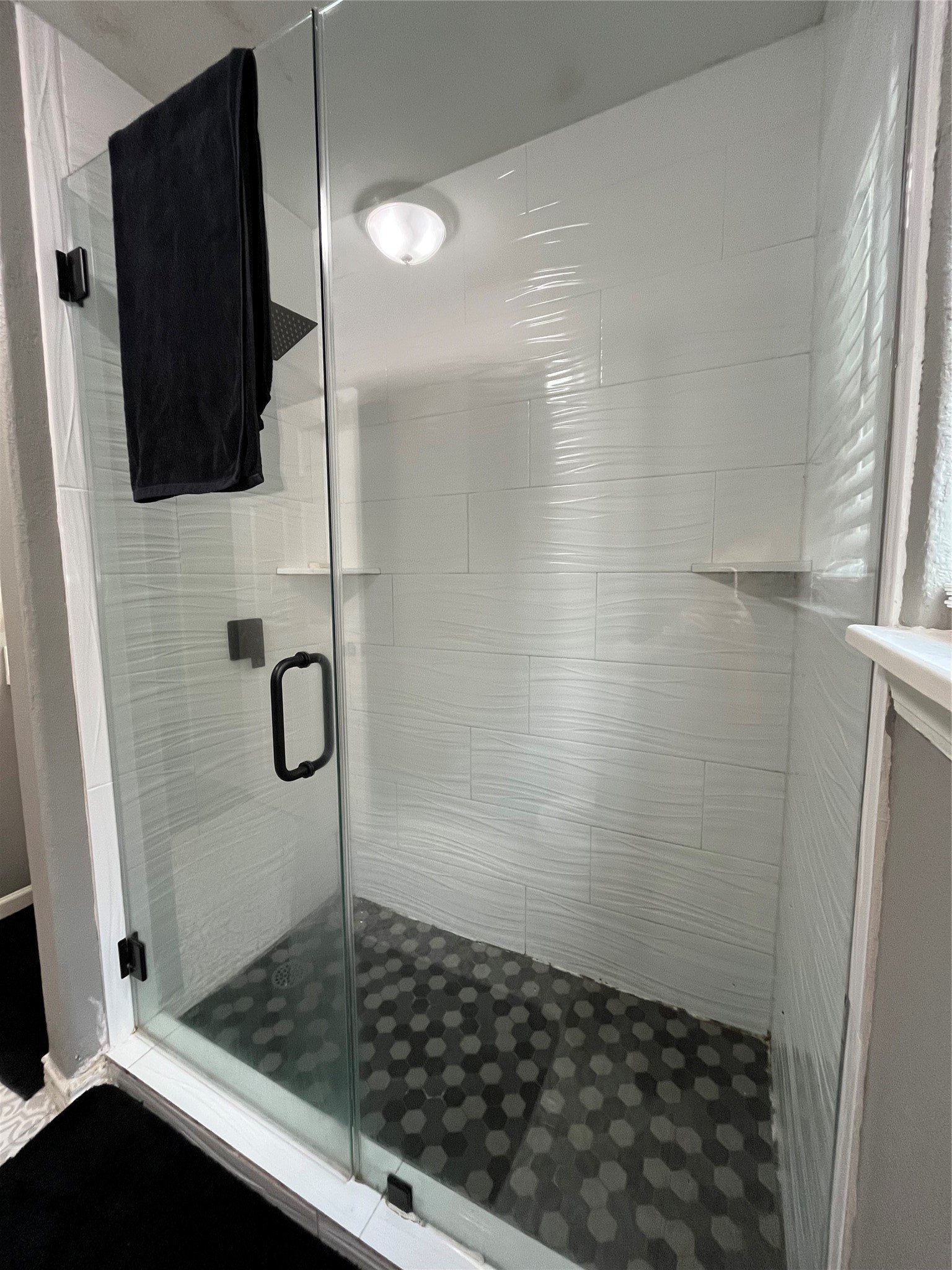 210 South Colbert Street Dayton, TX 77535 - Photo 4 of 14 a bathroom with a shower