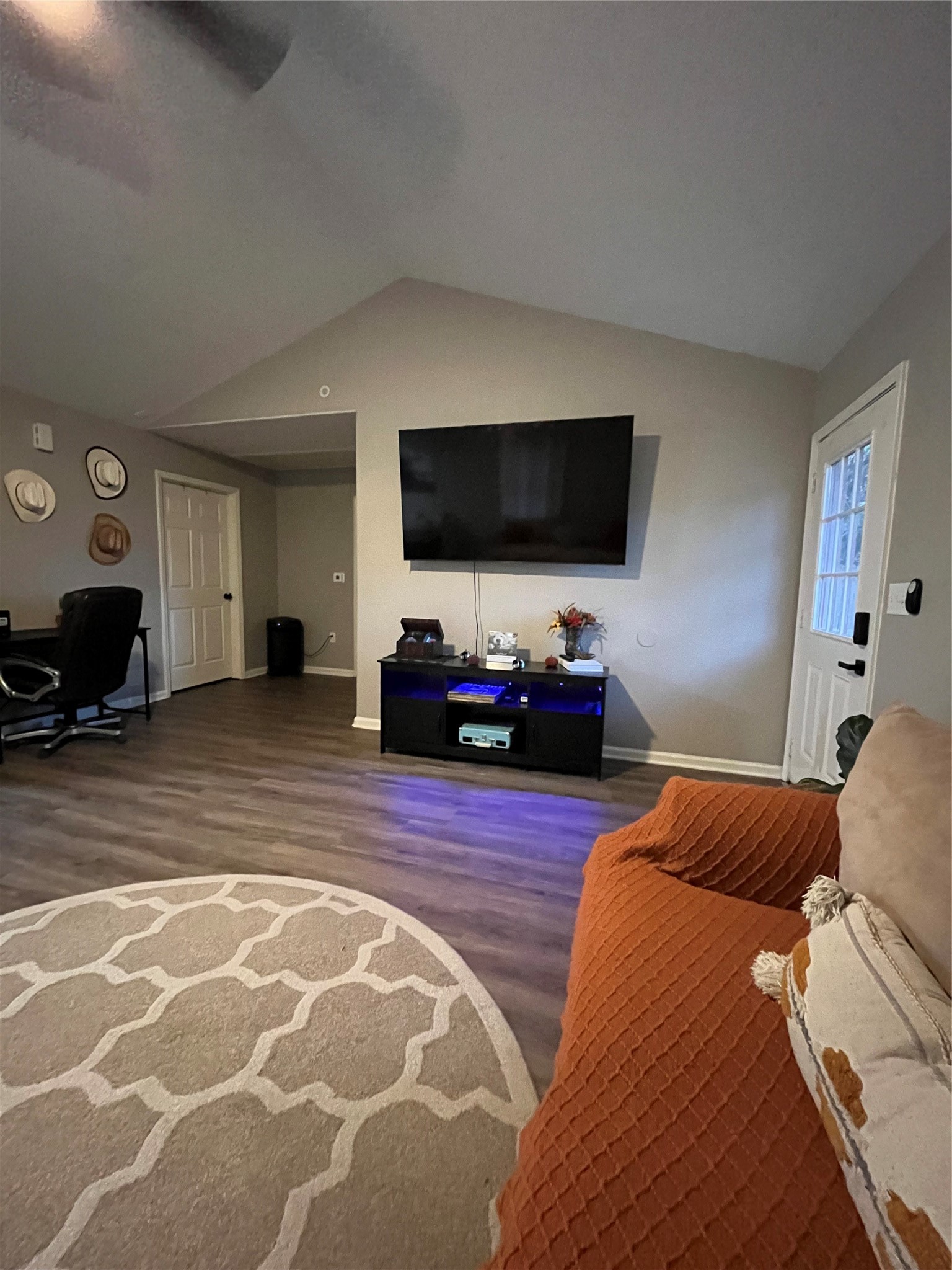 210 South Colbert Street Dayton, TX 77535 - Photo 9 of 14 a living room with furniture and a flat screen tv