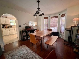 239 Pelham Road Amherst, MA 01002 - Photo 11 of 30 a view of a dining room with furniture window and wooden floor
