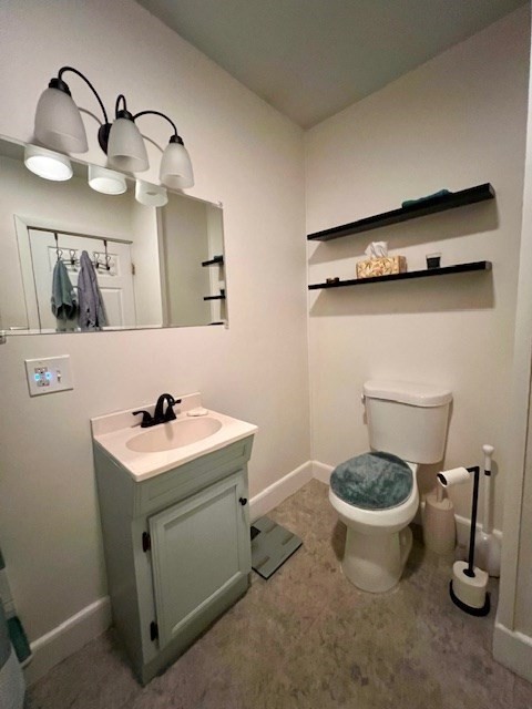 239 Pelham Road Amherst, MA 01002 - Photo 19 of 30 a bathroom with a toilet and sink