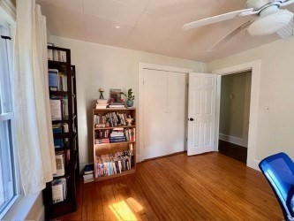 239 Pelham Road Amherst, MA 01002 - Photo 24 of 30 a view of a room with wooden floor and closet