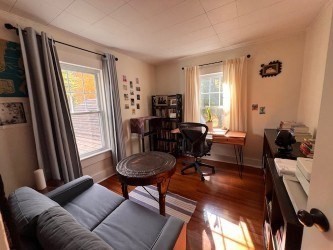 239 Pelham Road Amherst, MA 01002 - Photo 26 of 30 a living room with furniture and a window