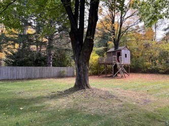 239 Pelham Road Amherst, MA 01002 - Photo 29 of 30 a view of backyard with table and chairs