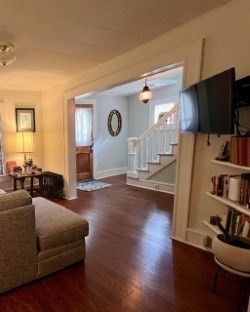 239 Pelham Road Amherst, MA 01002 - Photo 7 of 30 a living room with furniture and a flat screen tv