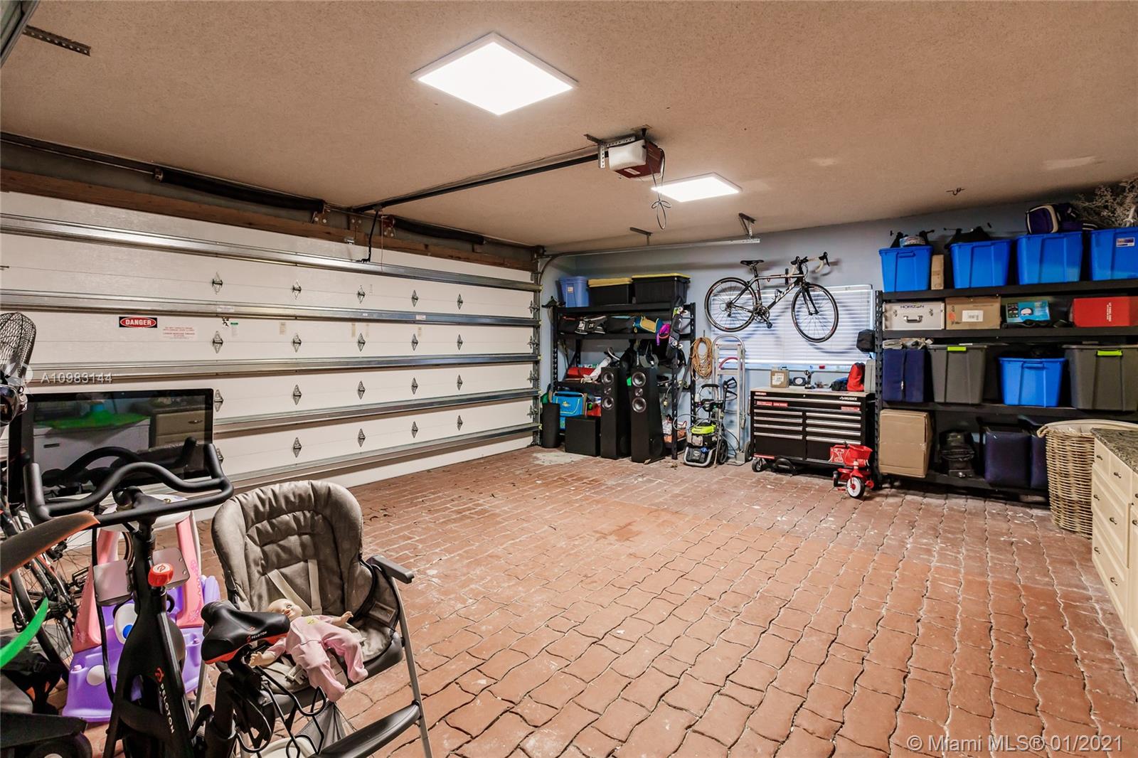 6400 Southwest 134th Drive Pinecrest, FL 33156 - Photo 24 of 50 a view of a room with gym equipment