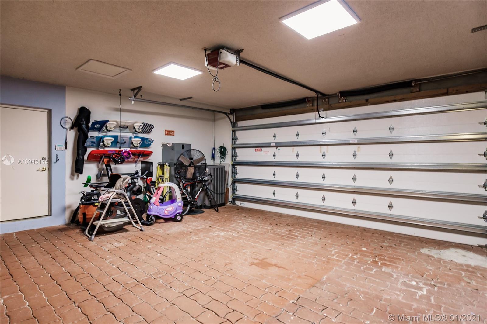 6400 Southwest 134th Drive Pinecrest, FL 33156 - Photo 25 of 50 a view of a room with gym equipment