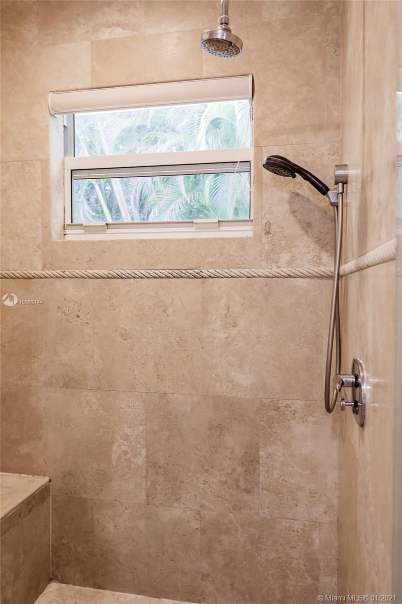 6400 Southwest 134th Drive Pinecrest, FL 33156 - Photo 37 of 50 a bathroom with a shower