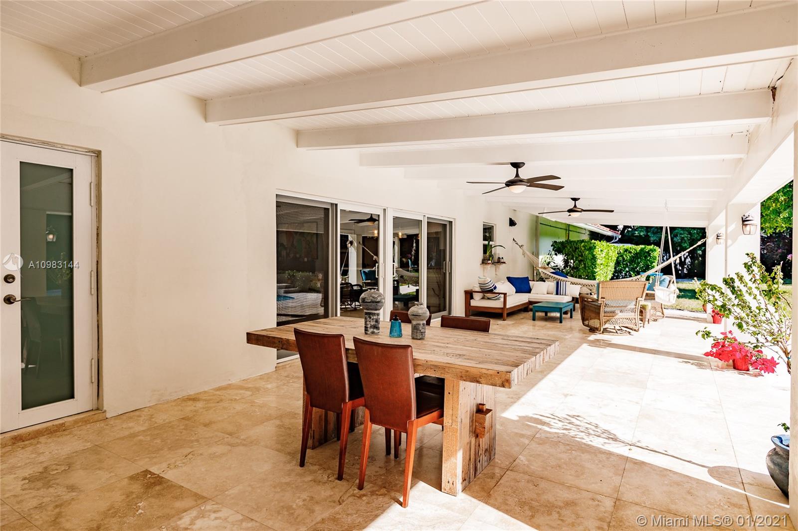 6400 Southwest 134th Drive Pinecrest, FL 33156 - Photo 42 of 50 a view of a dining room with furniture