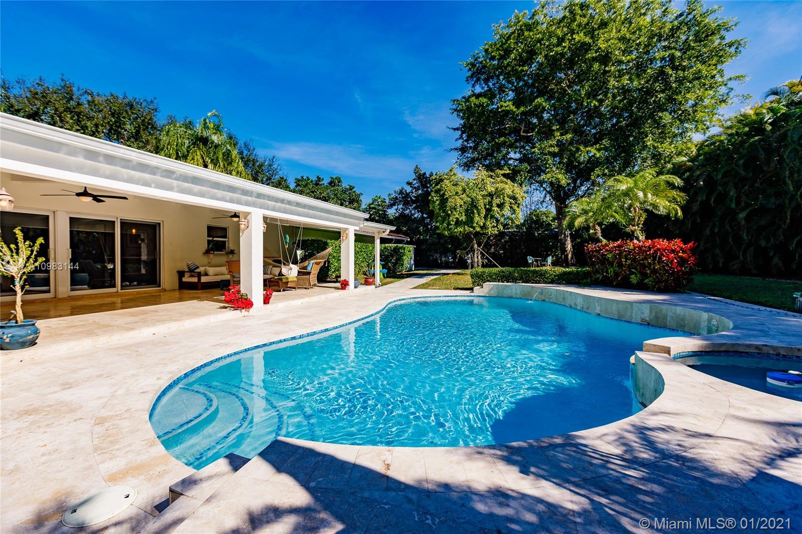 6400 Southwest 134th Drive Pinecrest, FL 33156 - Photo 44 of 50 a view of a house with backyard and sitting area