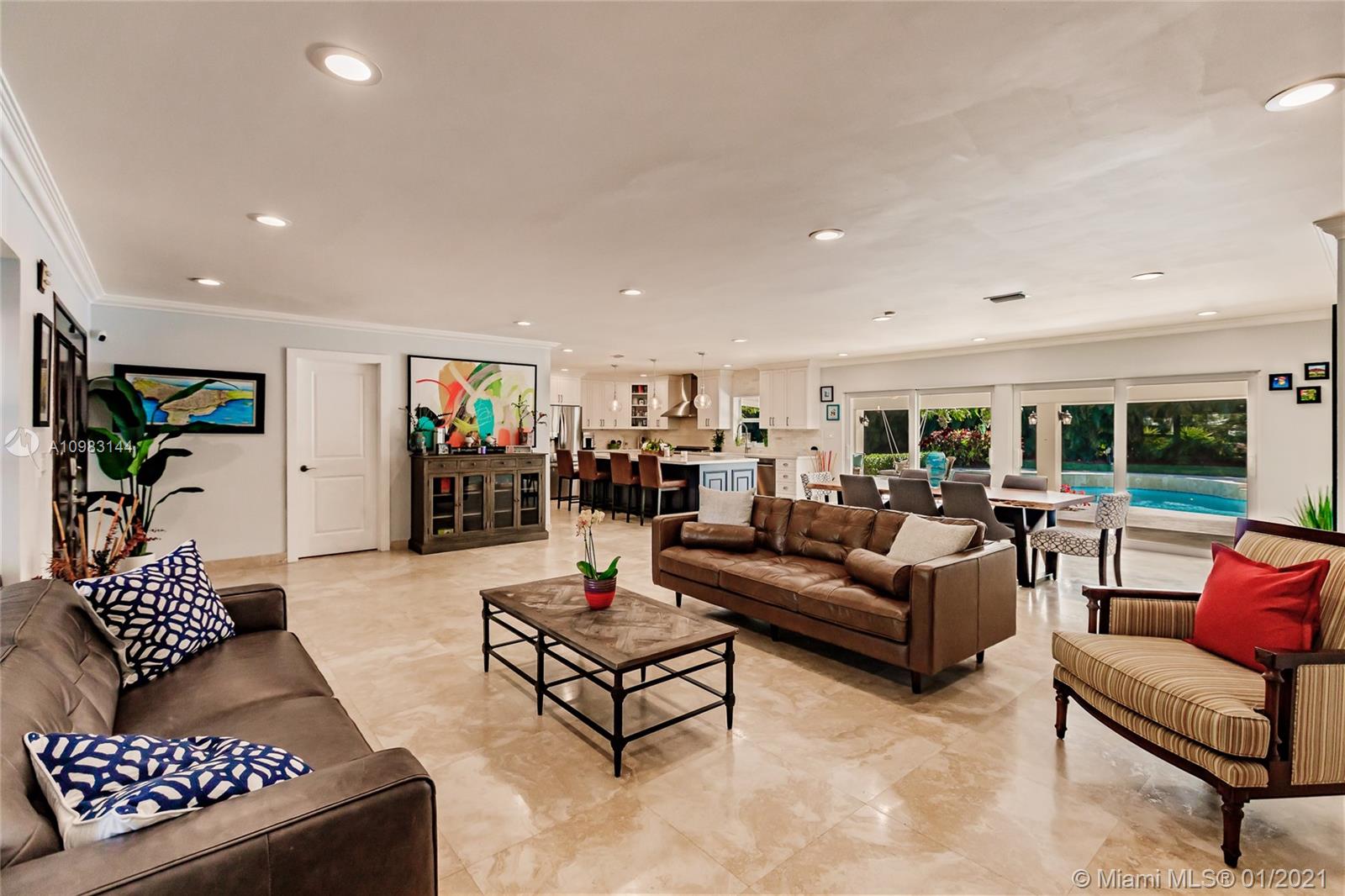 6400 Southwest 134th Drive Pinecrest, FL 33156 - Photo 7 of 50 a living room with furniture potted plant and a window