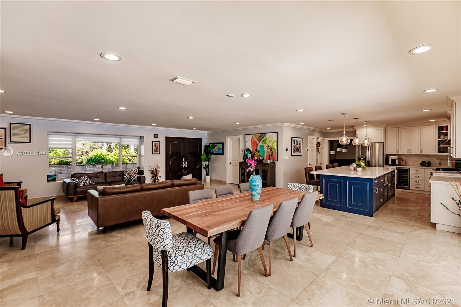 6400 Southwest 134th Drive Pinecrest, FL 33156 - Photo 8 of 50 a living room with furniture kitchen view and a large window