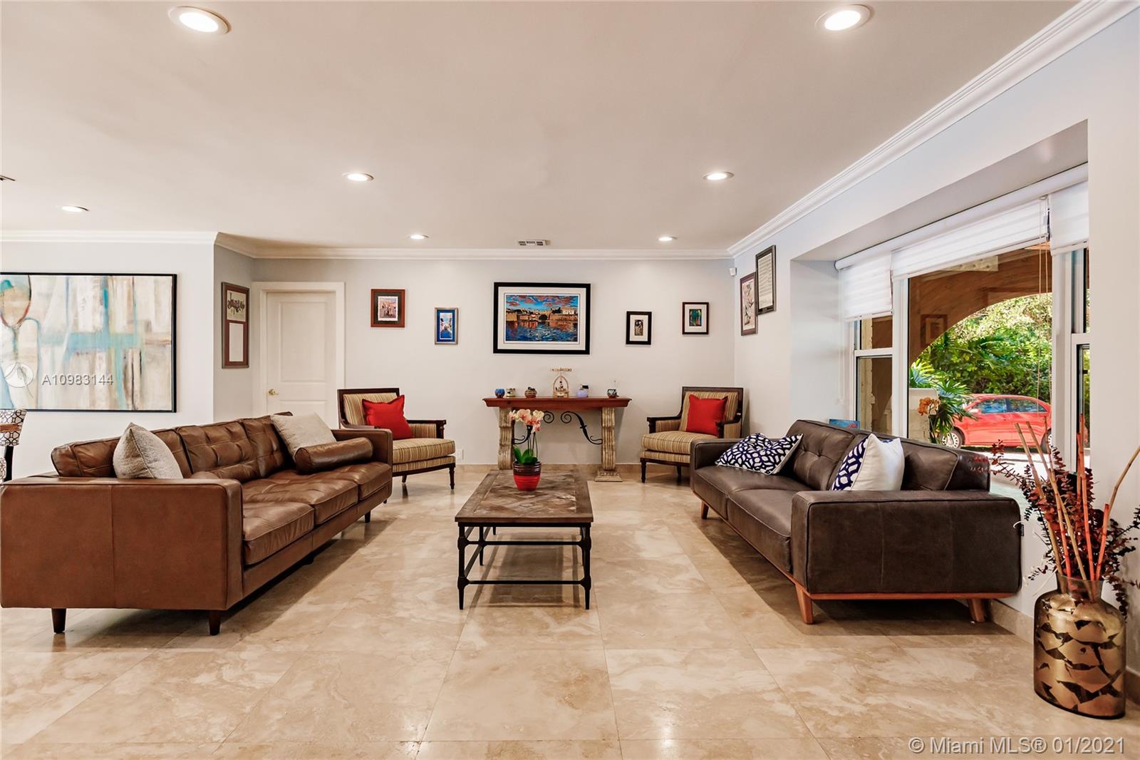 6400 Southwest 134th Drive Pinecrest, FL 33156 - Photo 10 of 50 a living room with furniture and a large window