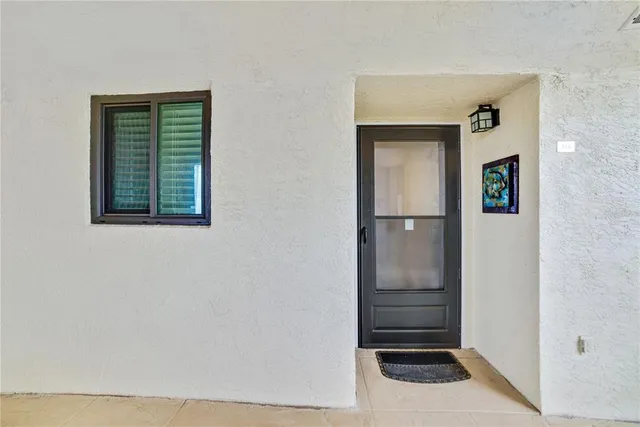 a view of swimming pool from a balcony