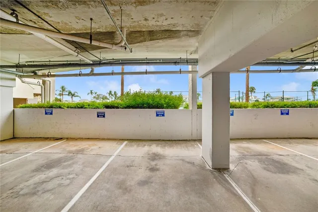 a bedroom with furniture and a flat screen tv