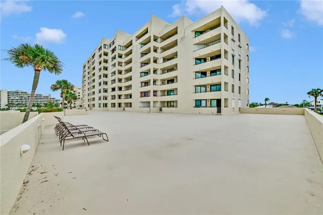 a view of backyard with a garden and plants