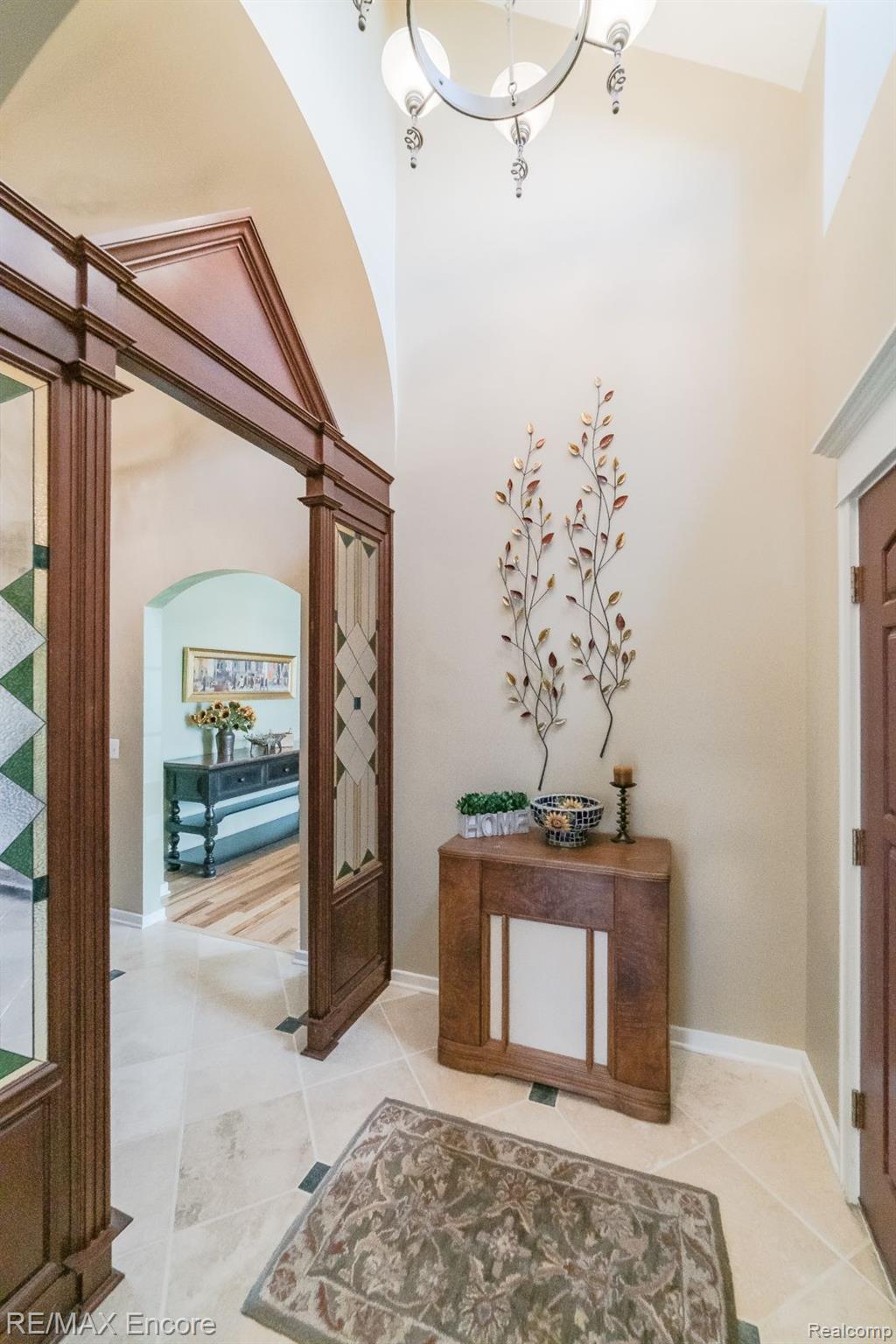 Custom stained glass feature in the soaring foyer