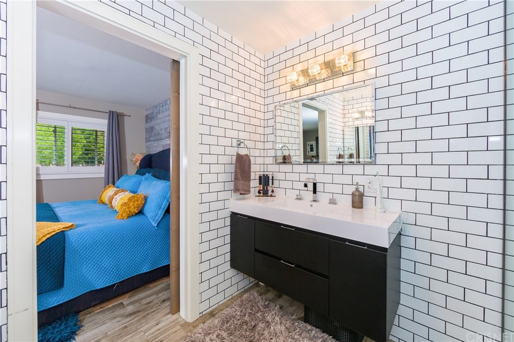 24344 Valley Street Newhall, CA 91321 - Photo 19 of 49 main house main bathroom/bedroom