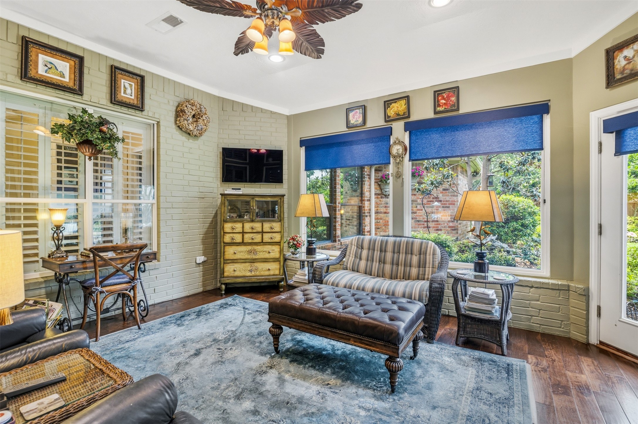 12215 Pebble Meadows Houston, TX 77041 - Photo 23 of 44 The added bonus sunroom is 252 sq.ft and perfect for relaxing. It features large picture windows overlooking the backyard landscaping.