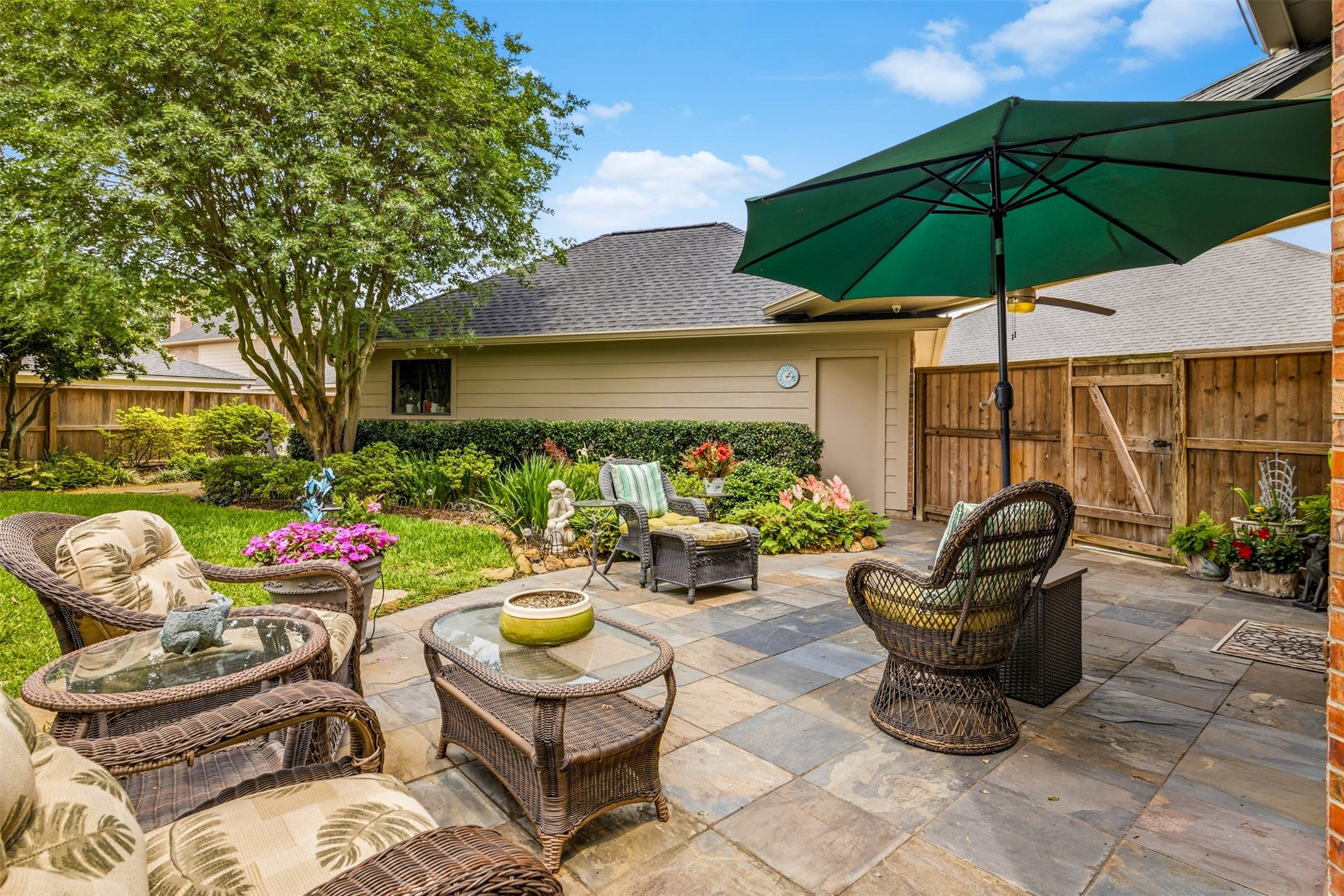 12215 Pebble Meadows Houston, TX 77041 - Photo 28 of 44 The backyard patio is perfect for outdoor entertaining.