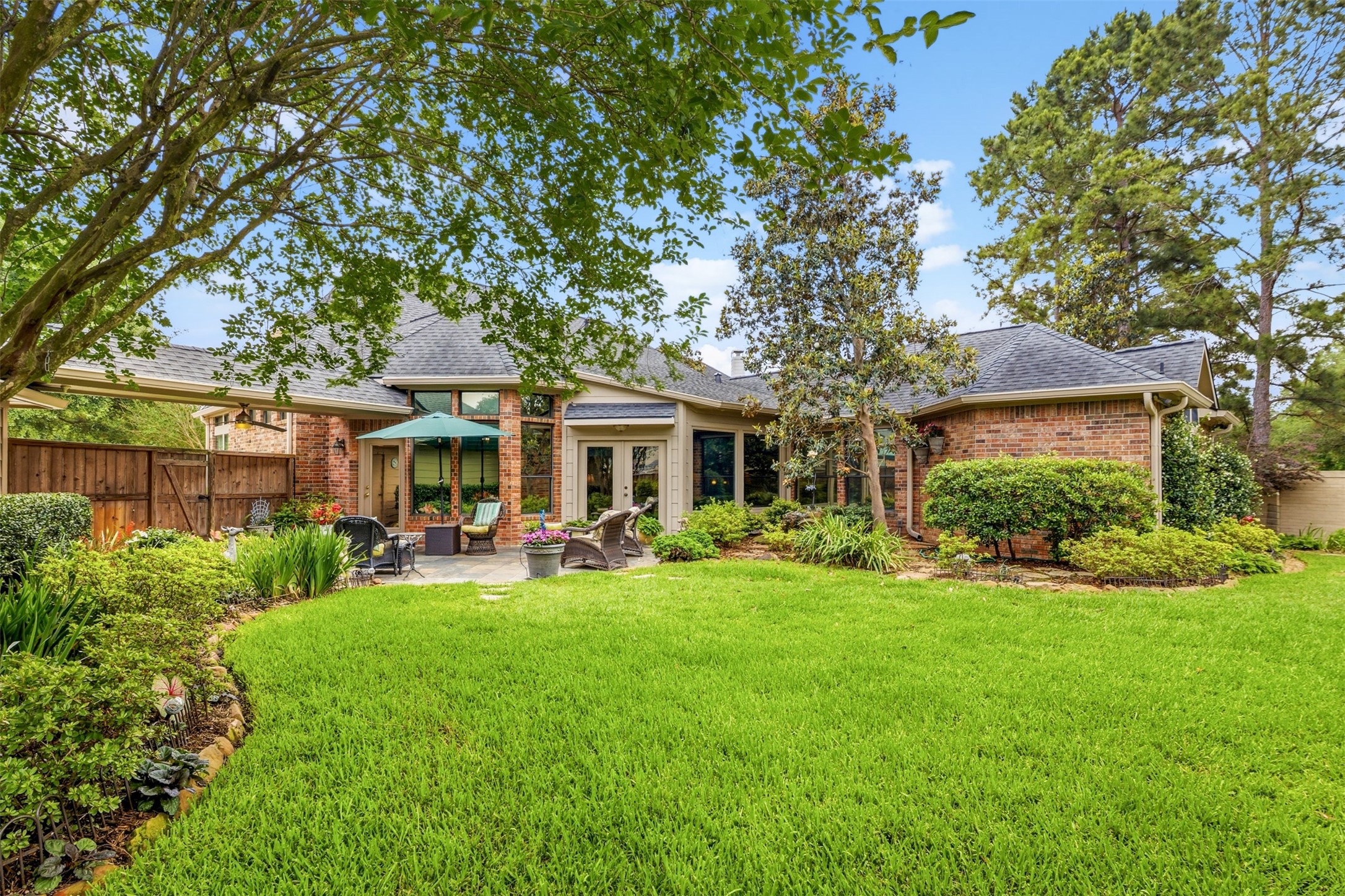 12215 Pebble Meadows Houston, TX 77041 - Photo 30 of 44 View of the back elevation of the home.