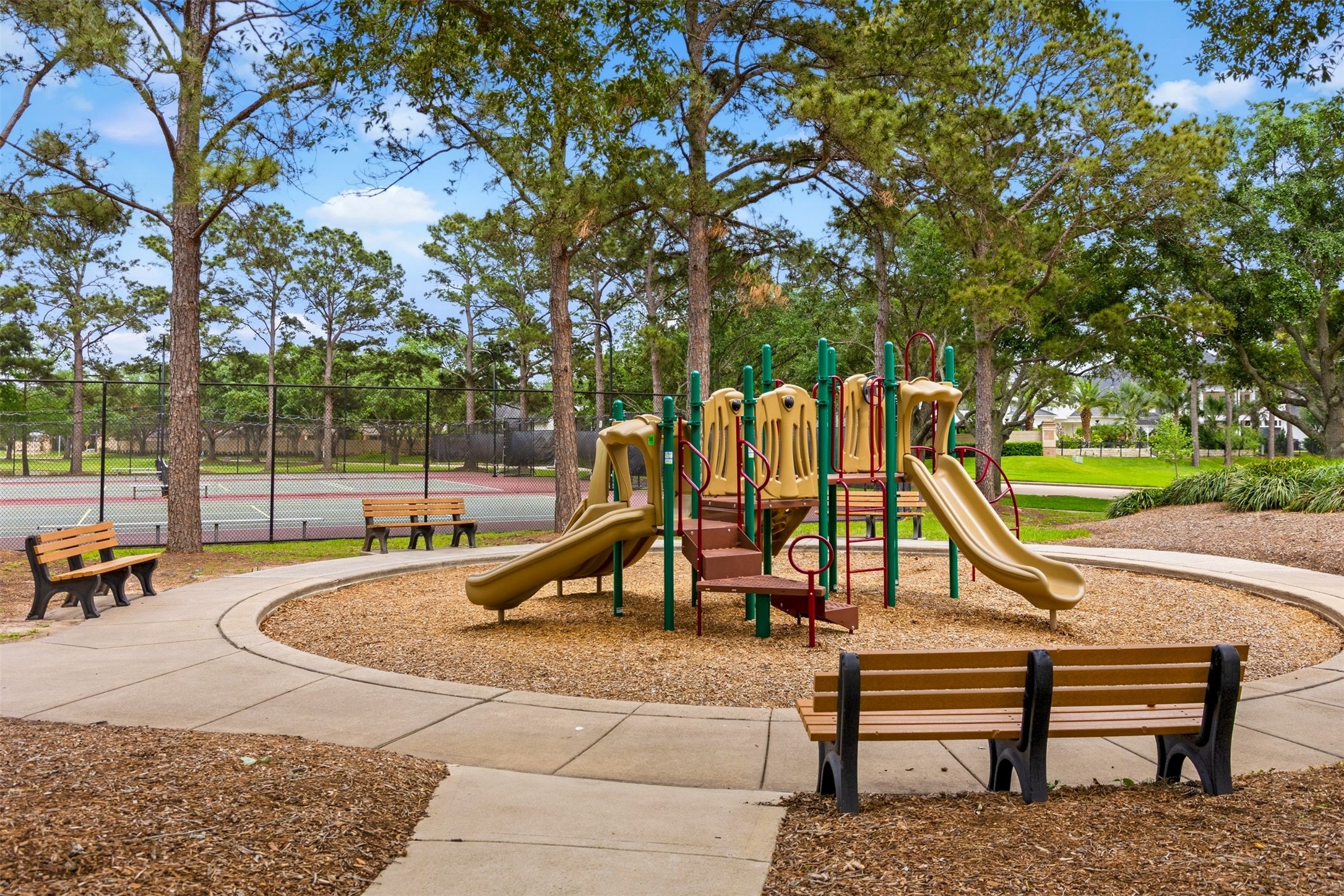12215 Pebble Meadows Houston, TX 77041 - Photo 36 of 44 View of the neighborhood playground and tennis courts.