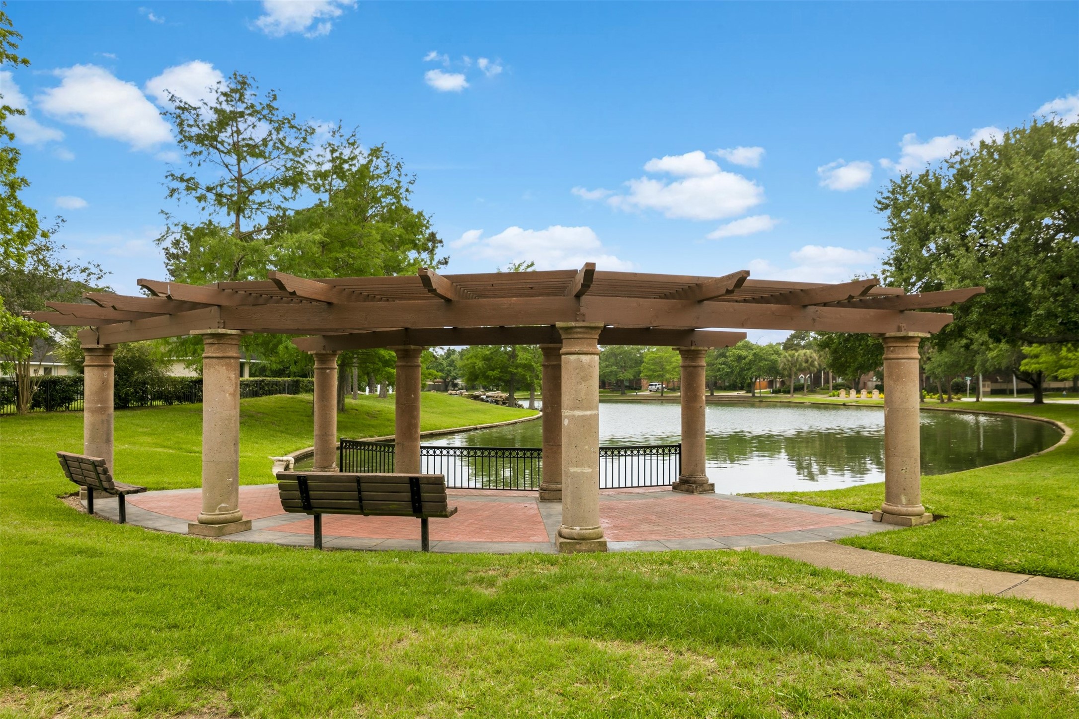 12215 Pebble Meadows Houston, TX 77041 - Photo 40 of 44 View of the sitting area looking over one of the neighborhood lakes.